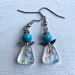 Blå lyse øreringe med et rødt skær