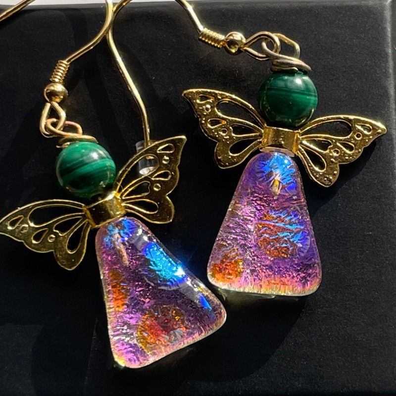 Øreringe der skinner