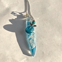 Blå glasfjer med engel