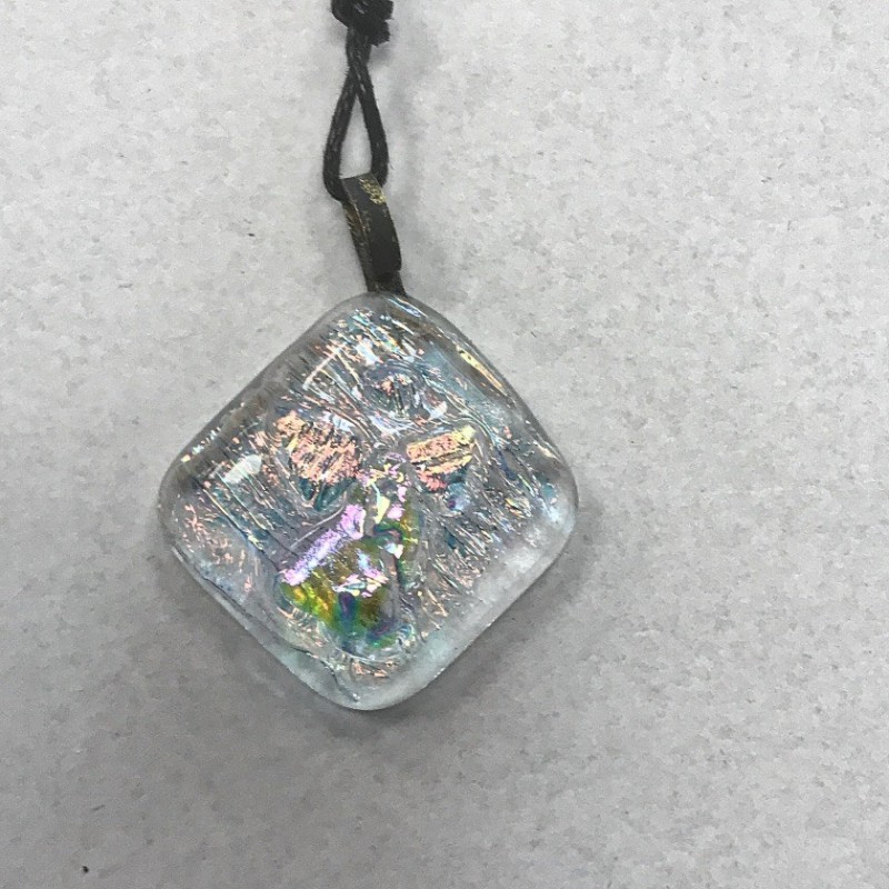 Orange skinnende engel